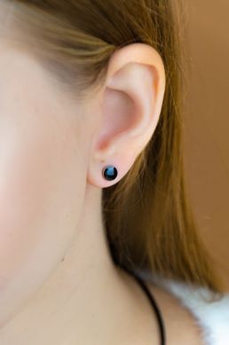 Silver stud earrings with black enamel