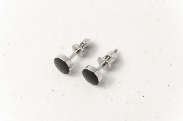 Silver stud earrings with black enamel