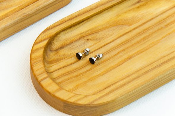 Silver stud earrings with black enamel
